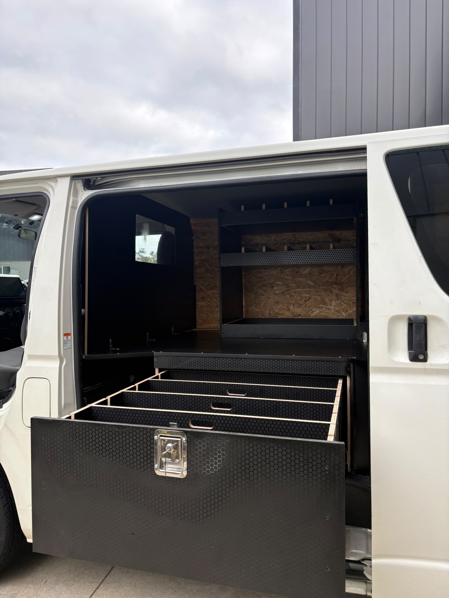 Custom drawer storage for a work van